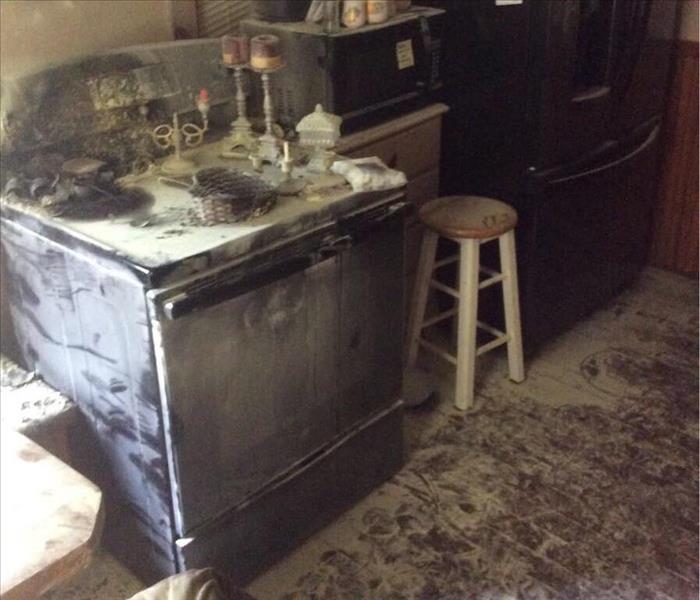white powder all over stove, stool, microwave and hardwood floor