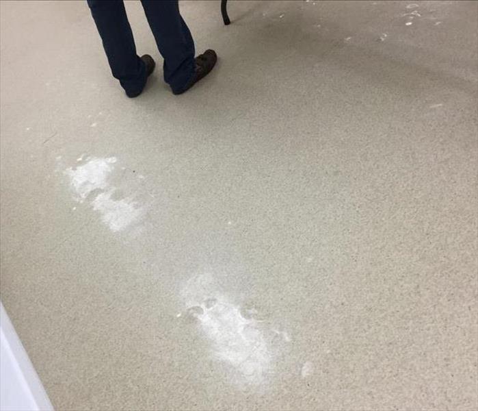 White vinyl flooring with bubbles underneath